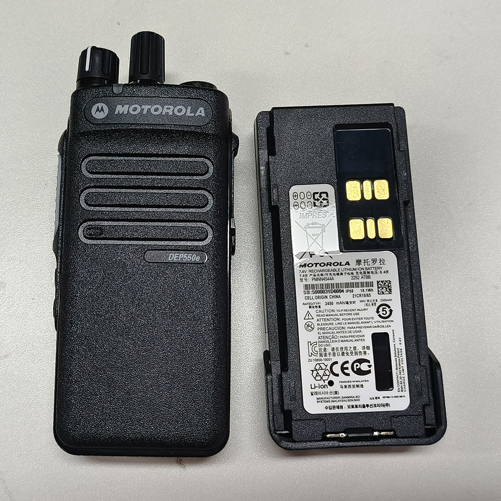 Motorola DEP550E portable radio front view showing IP67 waterproof rating, display, keypad and PTT button for DMR operation