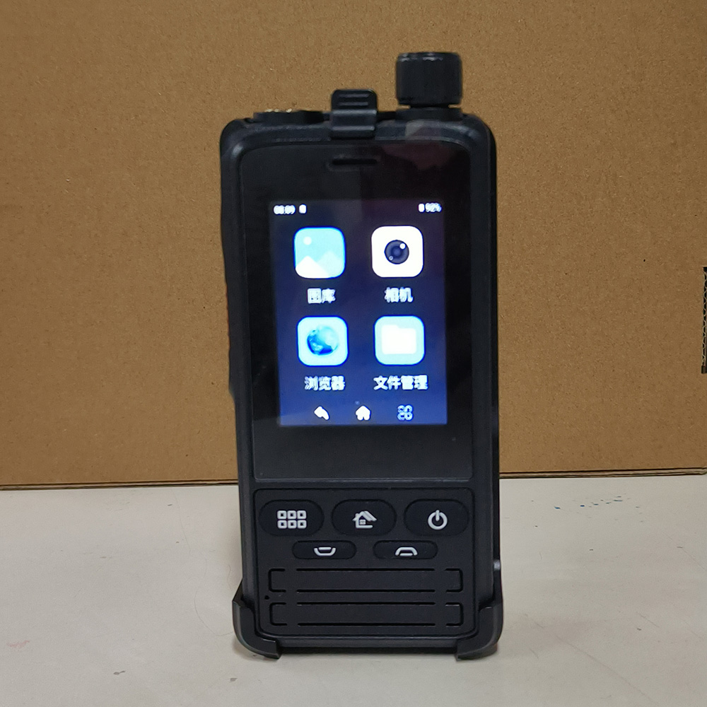 W19 4G PoC radio side view showing SIM card slot, USB charging port and rugged outdoor body for hiking and camping use